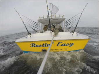 View of the Restin' Easy charter boat from behind